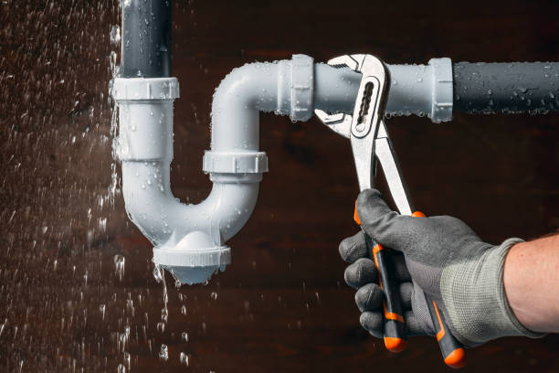 Professional Drain Cleaning technician working in Hingham, WI